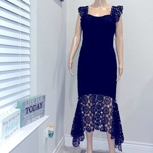 Vintage Lina black crocheted fully lined dress.